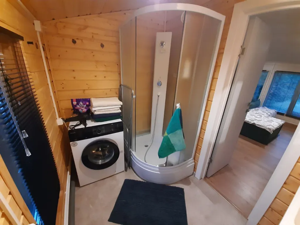 Дом в  соснах.