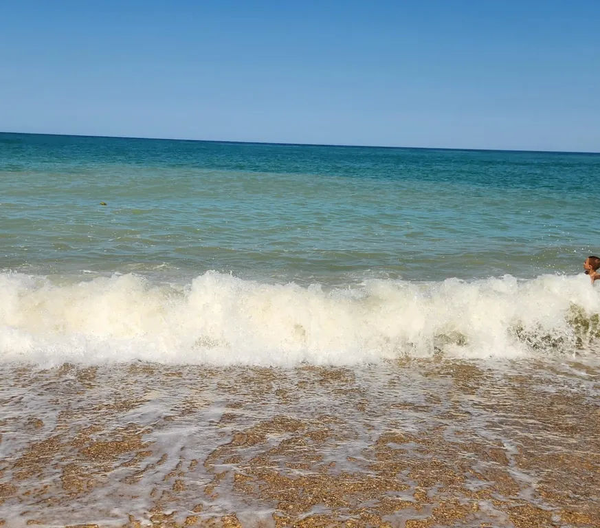 Уютный дом в живописном поселке у моря