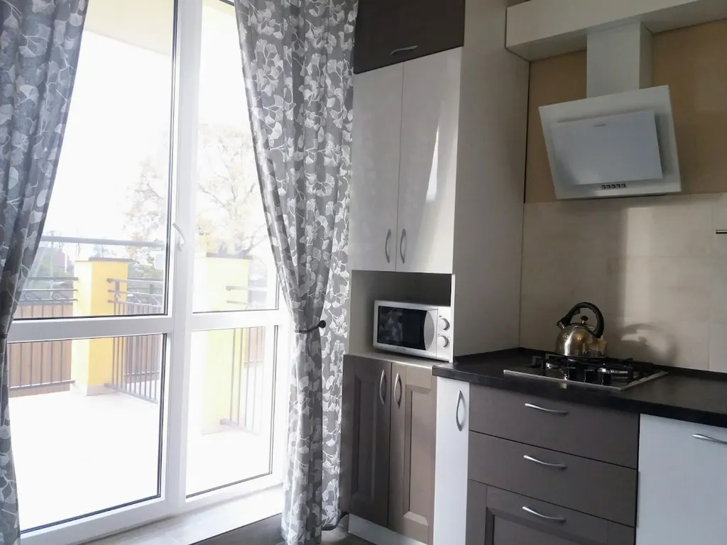 Новая квартира с солнечной террасой между морем и озером