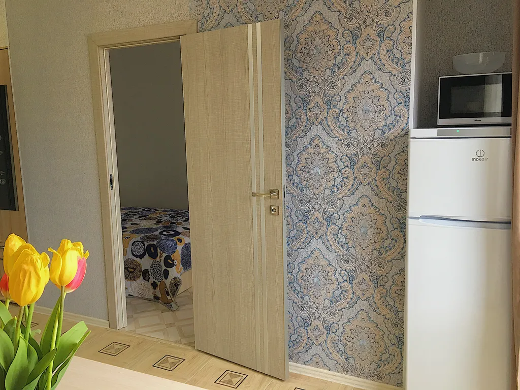 Четырехместная однокомнатная квартира с балконом в центре