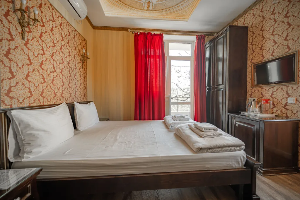 Двухместная комната с двуспальной кроватью НР