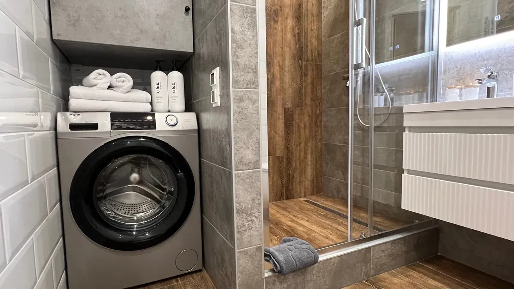 Апартамент у часовой башни и дома гильдии