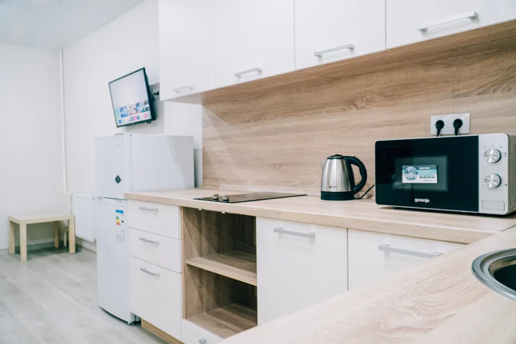 Милая студия для троих. Две кровати