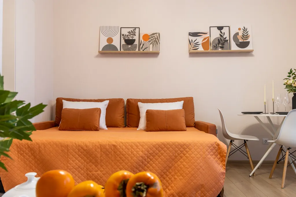 Студия Горизонты Нижнего Оранжево-изумрудный