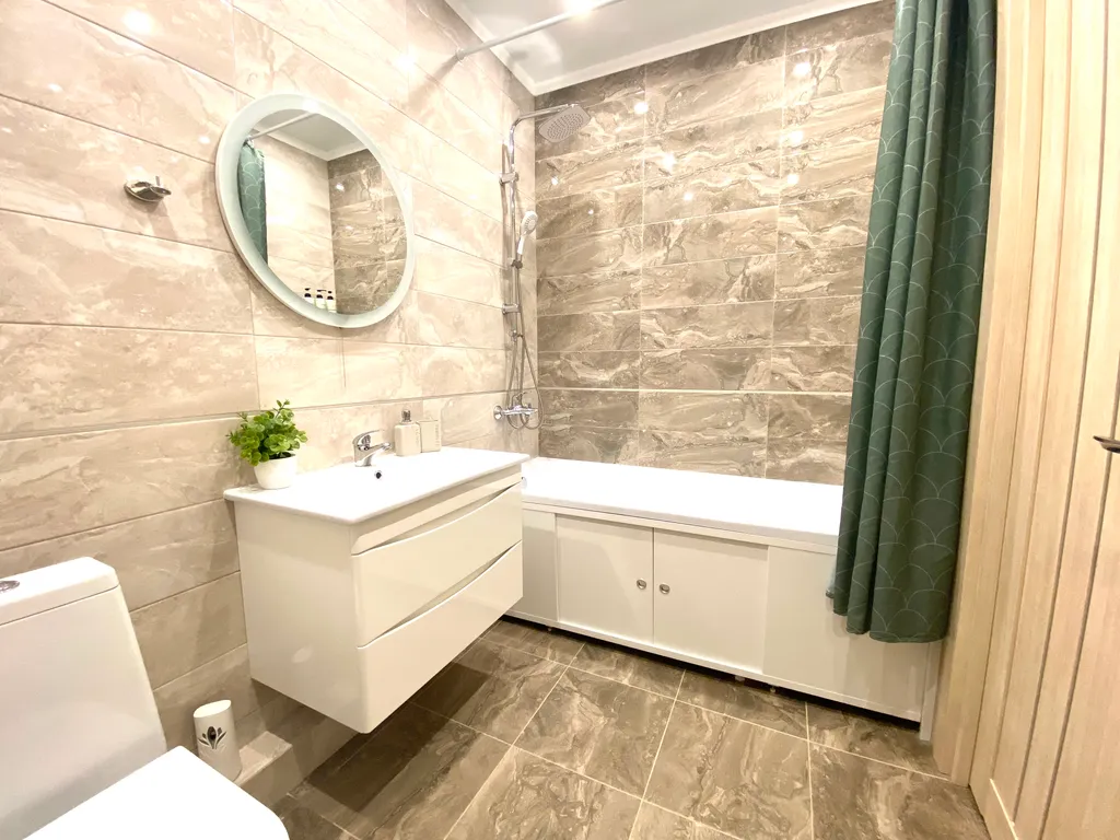 Современная квартира в центре в новом доме с частной парковкой