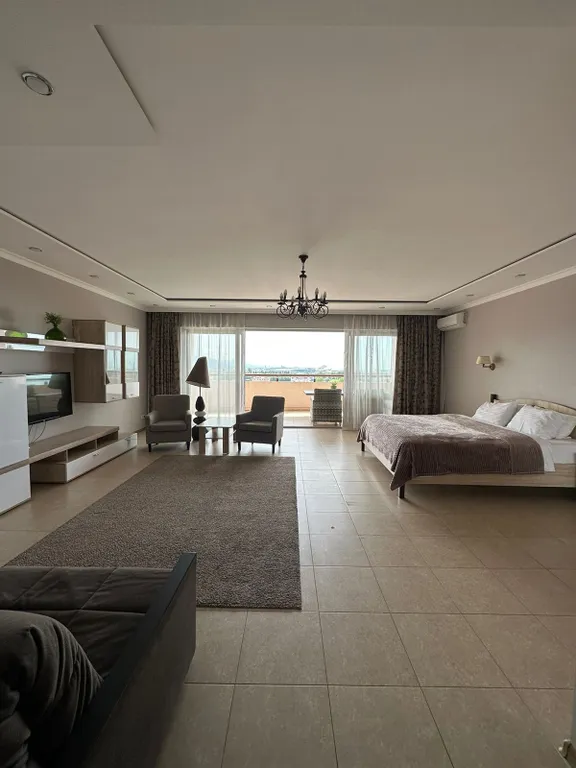 Апартаменты с большой террасой и видом на море