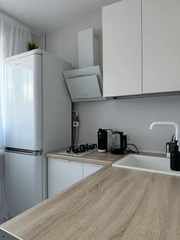 Стильная квартира с видом на колесо Обозрения