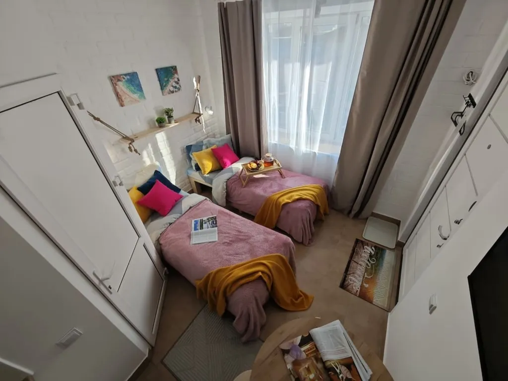 Стильная новая студия с кроватью-трансформером на двоих гостей