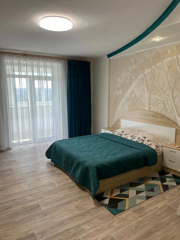 Апартаменты с видом на озеро и горы