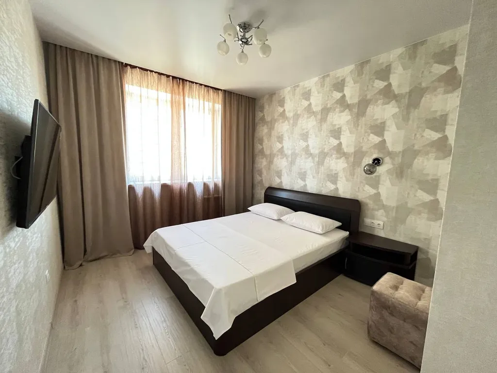 Трехкомнатная квартира-студия в центральном районе