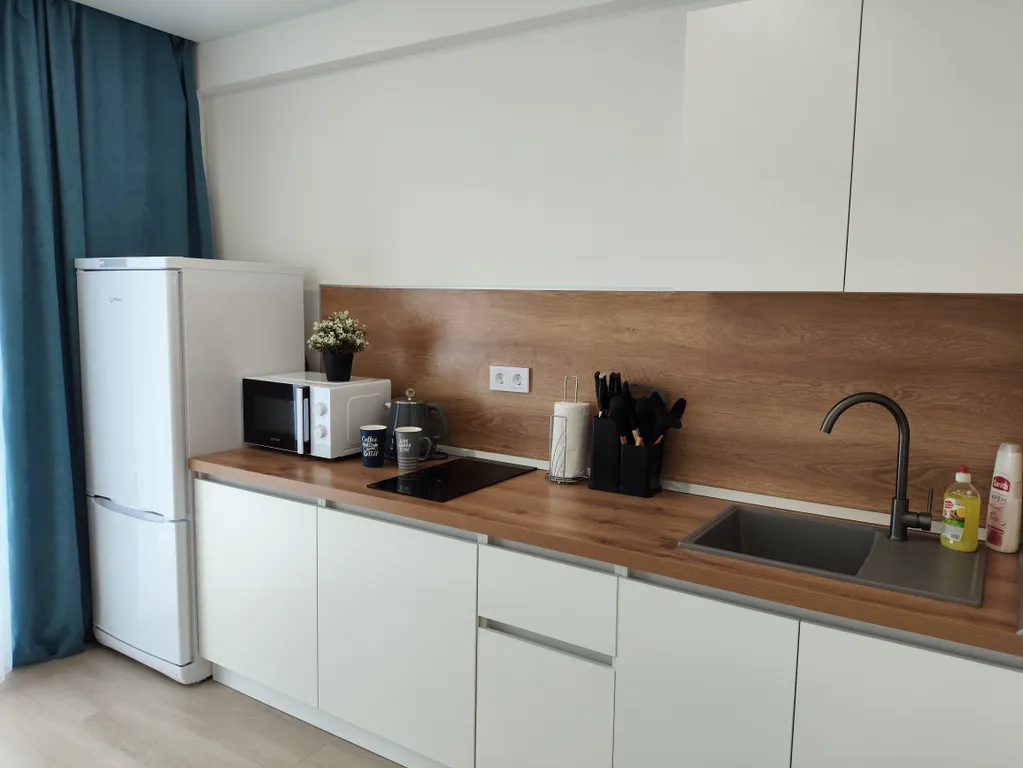 1-комнатная квартира с обзорным видом на город и лес