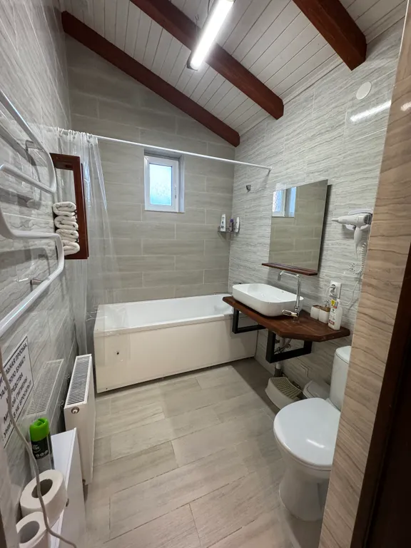 Коттедж Трёхкомнатные апартаменты с видом на горы — Архыз