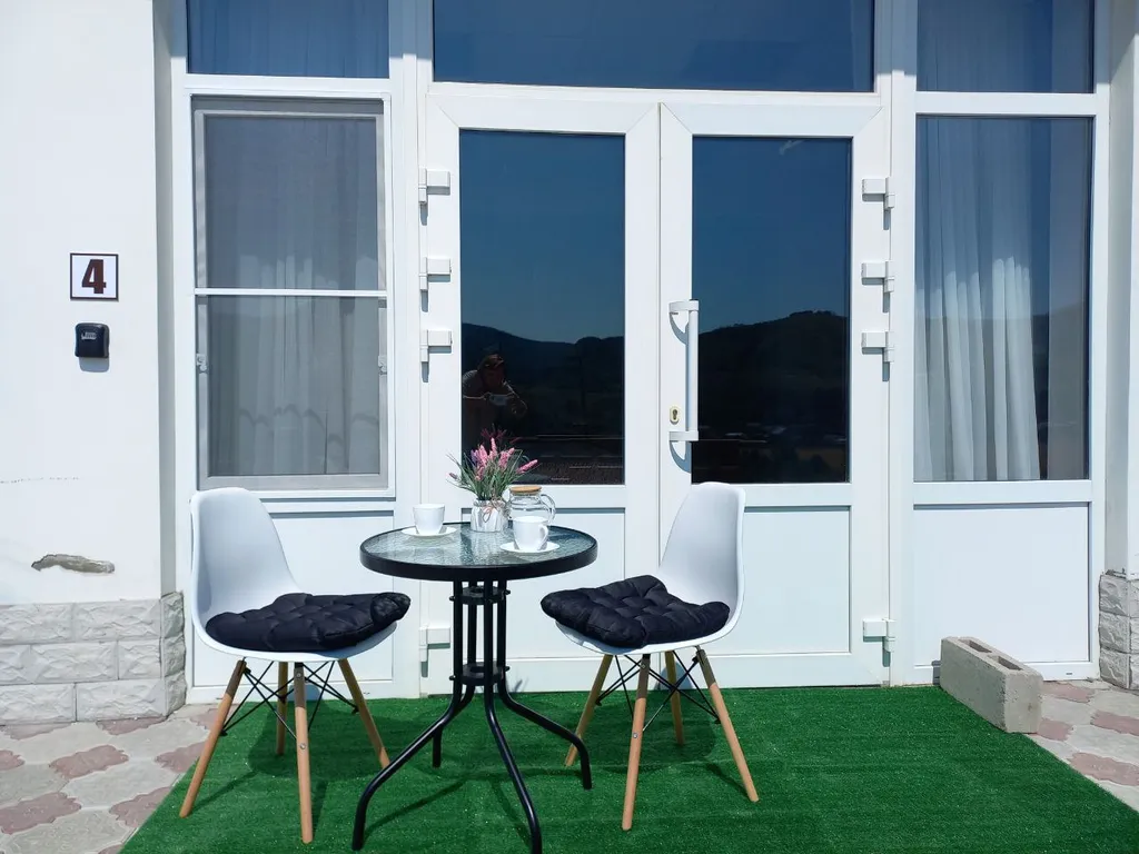 Комфортный семейный номер-студия с видом на горы