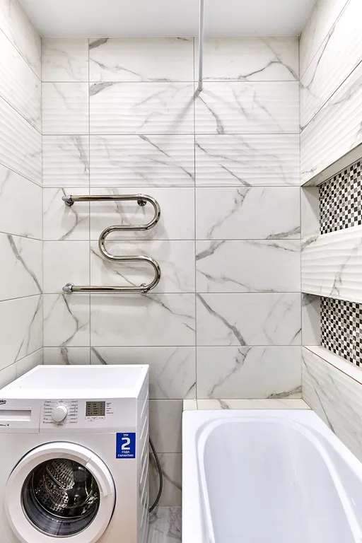 Апартаменты Оранж с диваном в кухне-гостиной