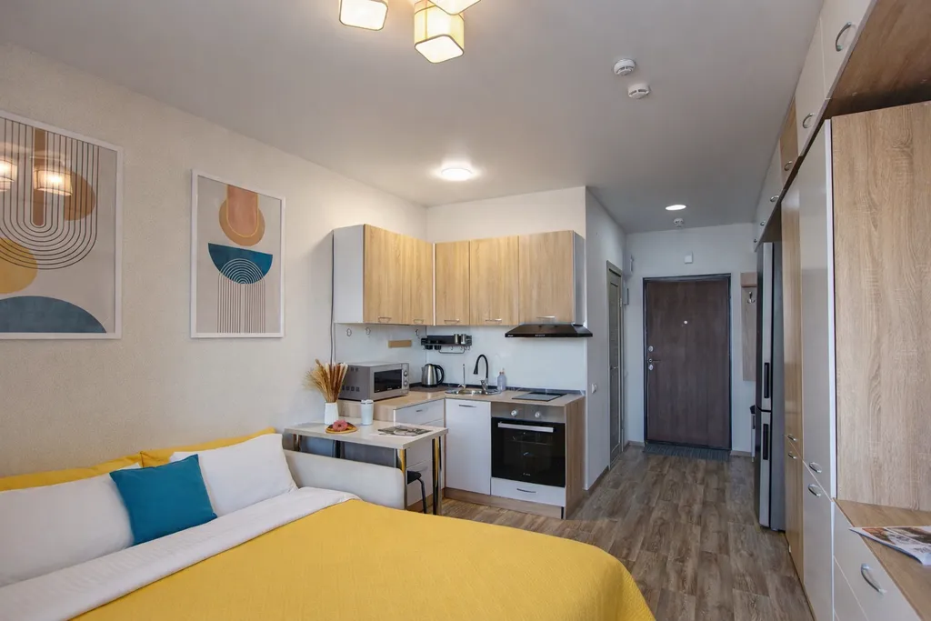 Уютная студия с красивым балконом