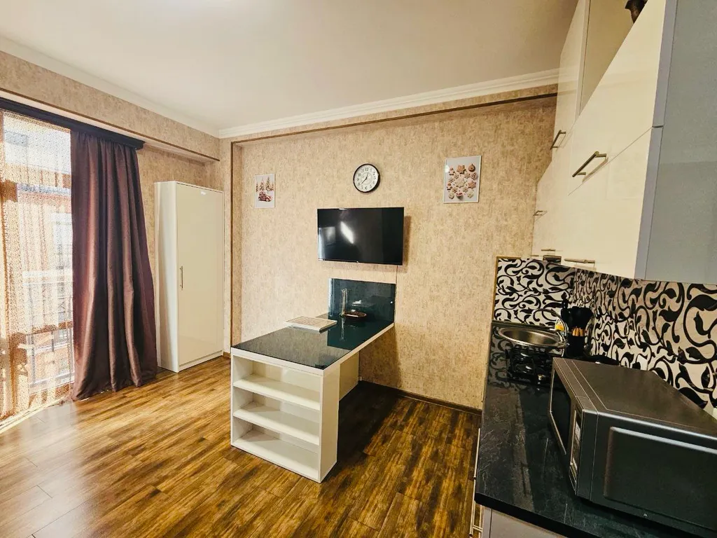 Квартира в центре с 1 спальней и кухней-гостиной 6 этаж