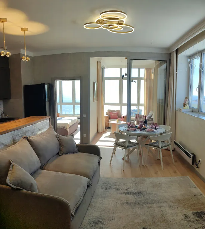 Апартамент Любимое Небо - море и горы - наслаждаться лежа на кровати