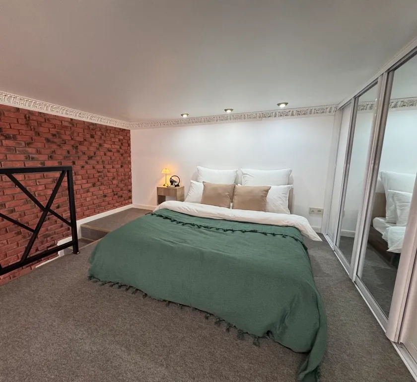 Двухуровневая стильная и комфортабельная квартира