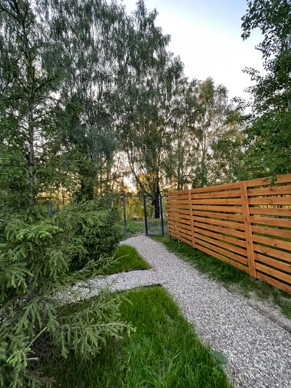 Дом с купелью на берегу реки