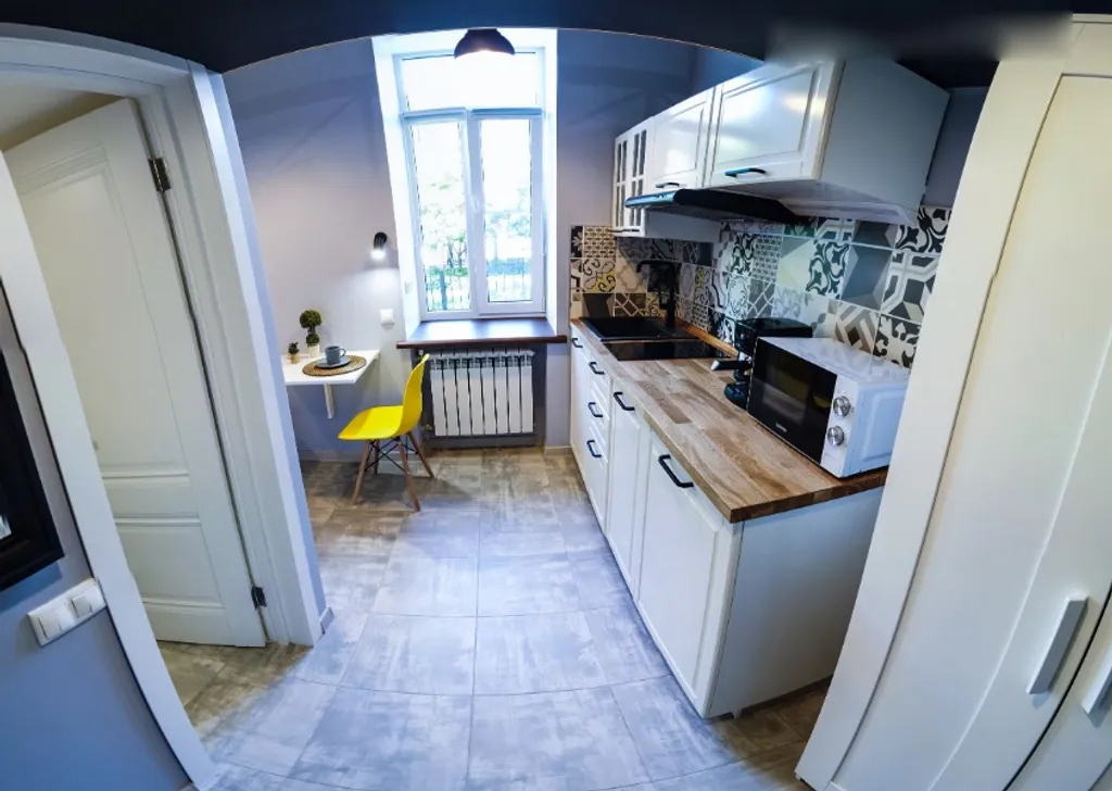 Двухуровневый апартамент с видом на сад