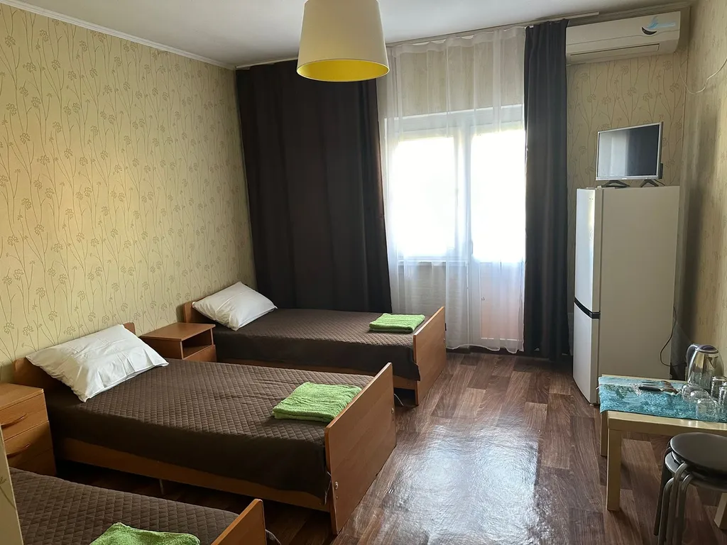 Трехместный номер с видом на сад