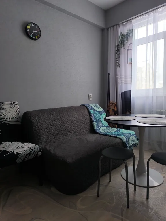 Квартира с балконом и видом на горы