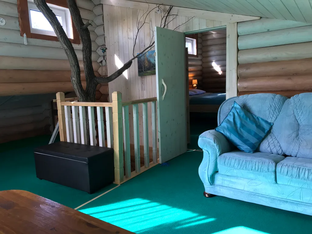 Дом из бревна Терем с сауной в черте города