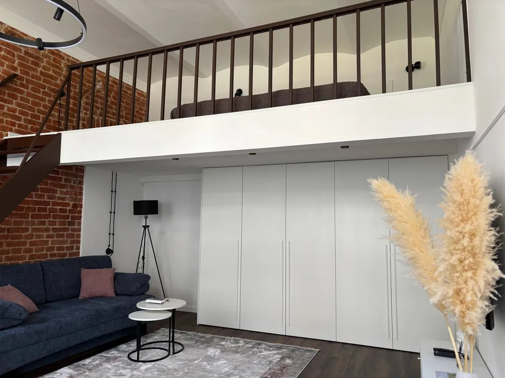 Эксклюзивная двухуровневая 1-комн. квартира с дизайнерским ремонтом