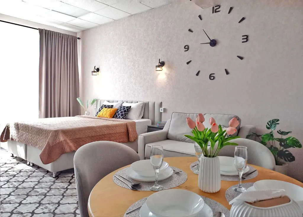 Комфортный семейный номер-студия с видом на горы