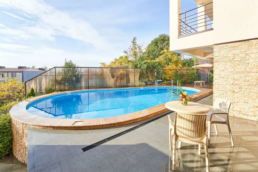 Квартира Двухуровневые апартаменты с выходом на теплый бассейн — Адлер