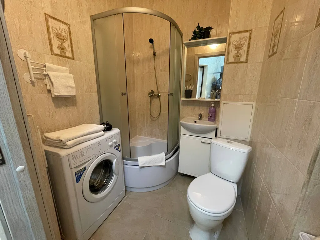 Квартира Квартира Уютная студия в Шушарах для командировочных, пар и пар с детьми — Шушары