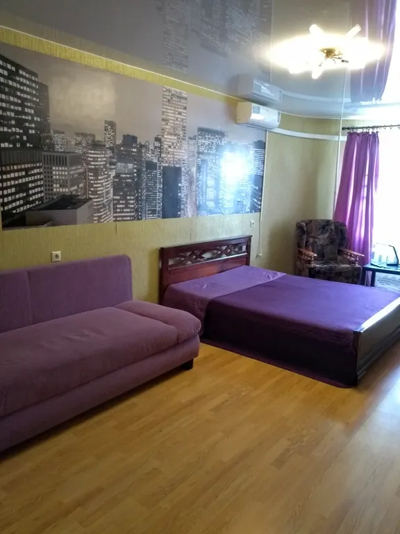 Уютная квартира в географическом центре города с кондиционером.