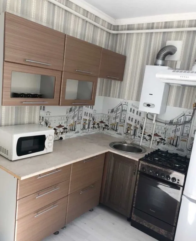 Уютная двухкомнатная квартира на Площади Строителей