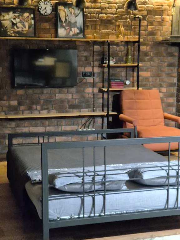 Студия лофт с видом на набережную столицы