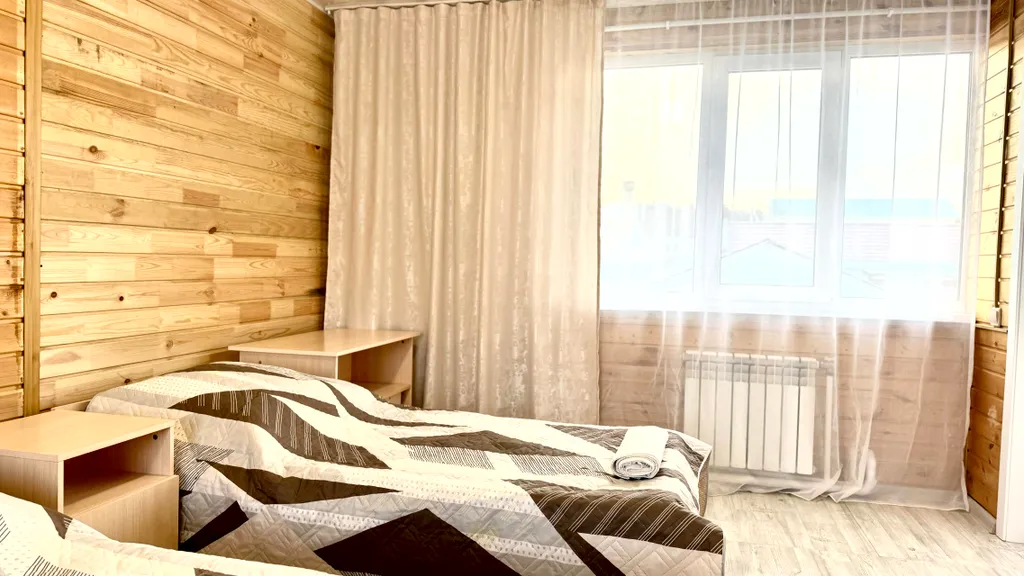 Трехместный уютный номер с видом на Байкал и возможностью доп места