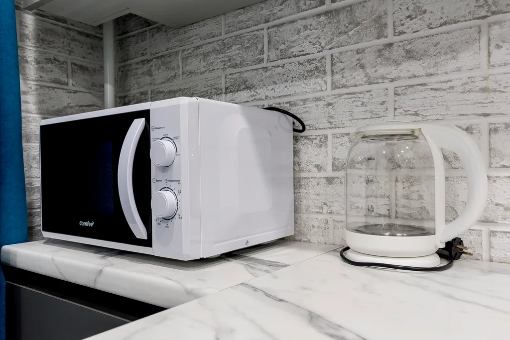 Уютная квартира в ЖК Паруса с подвесным креслом от Kravc Group