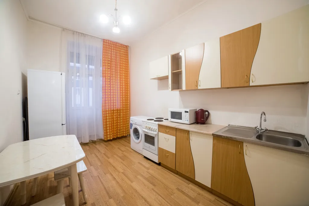 Светлая квартира в элитном доме с парковкой в самом центре