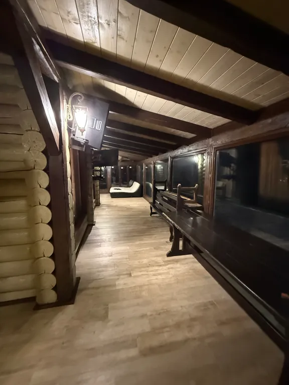 Двухэтажный дом из сруба а Теберде с баней с видом на горы и реку