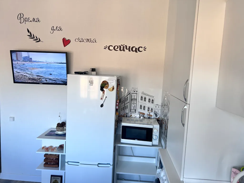 Милая квартирка с видом на горы и бассейном во дворе