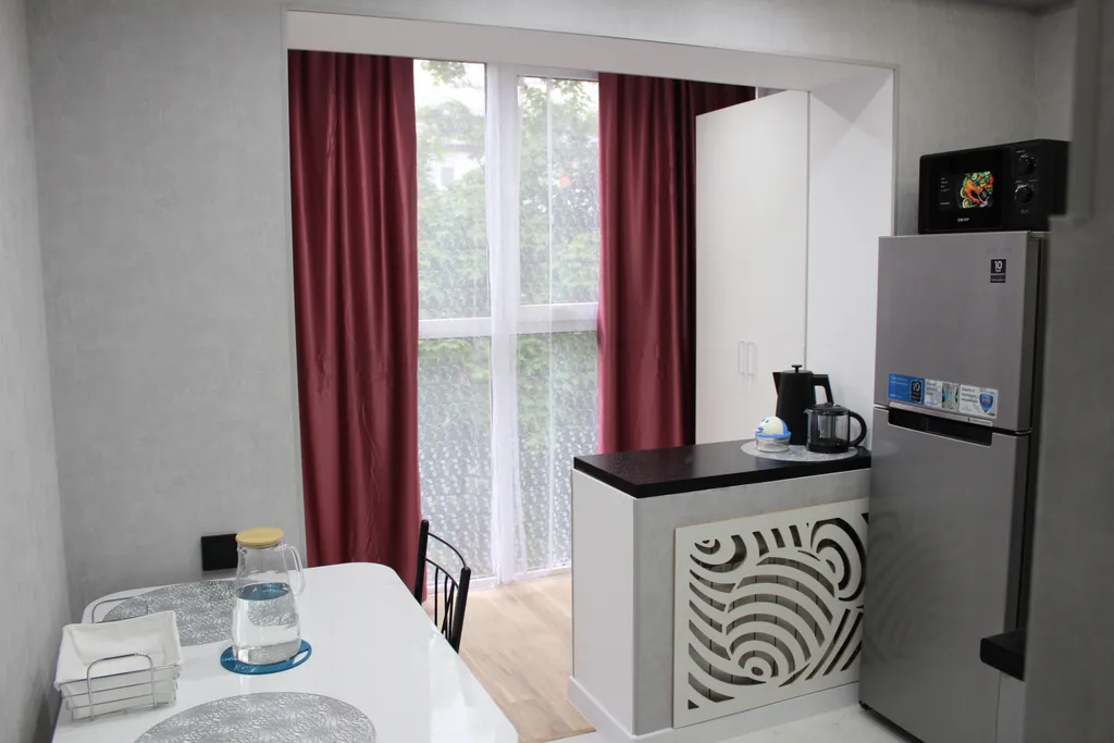 Уютная квартира с панорамными окнами