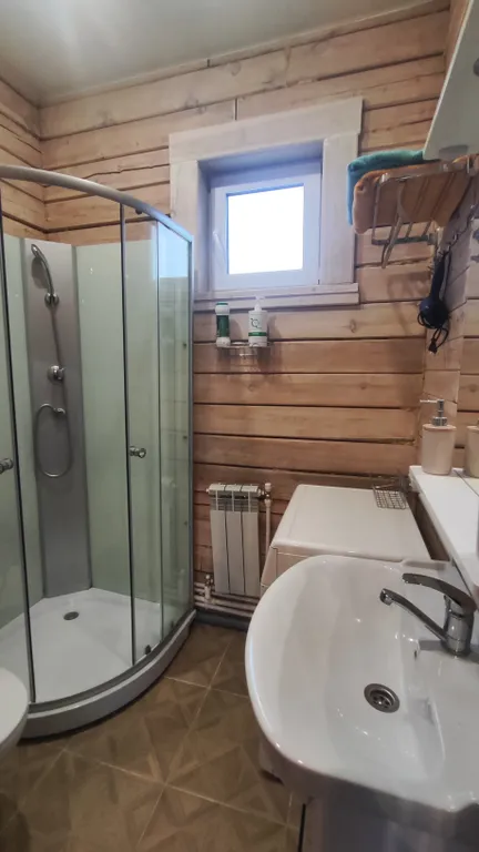 Дом с закрытой парковкой