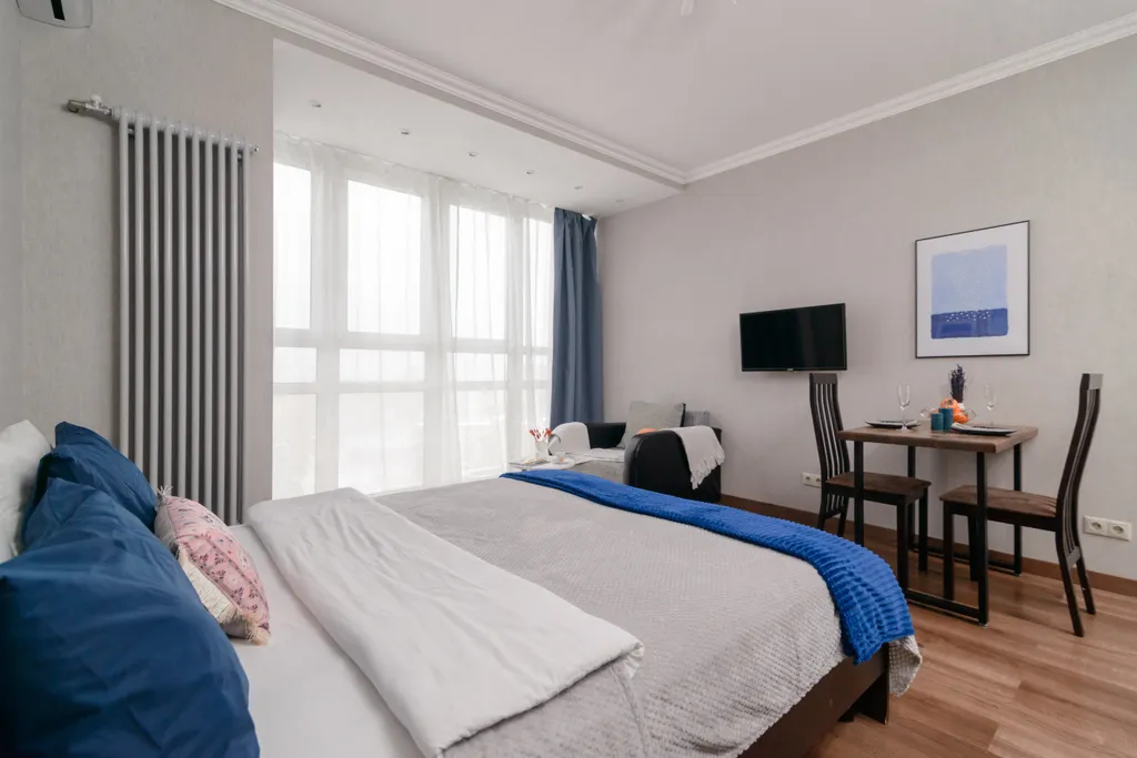 Уютная квартира с панорамными окнами