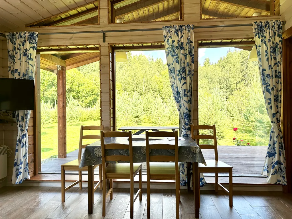 Коттедж с сауной и панорамным остеклением