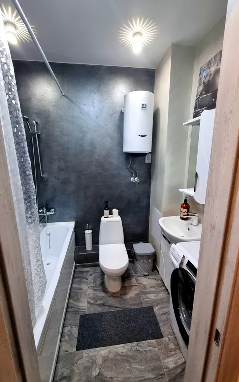 Уютная студия в сердце города на 13 этаже с панорамным видом