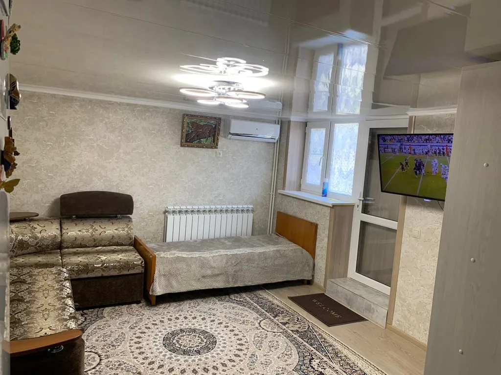 Уютная комната-студия со всеми удобствами в центре