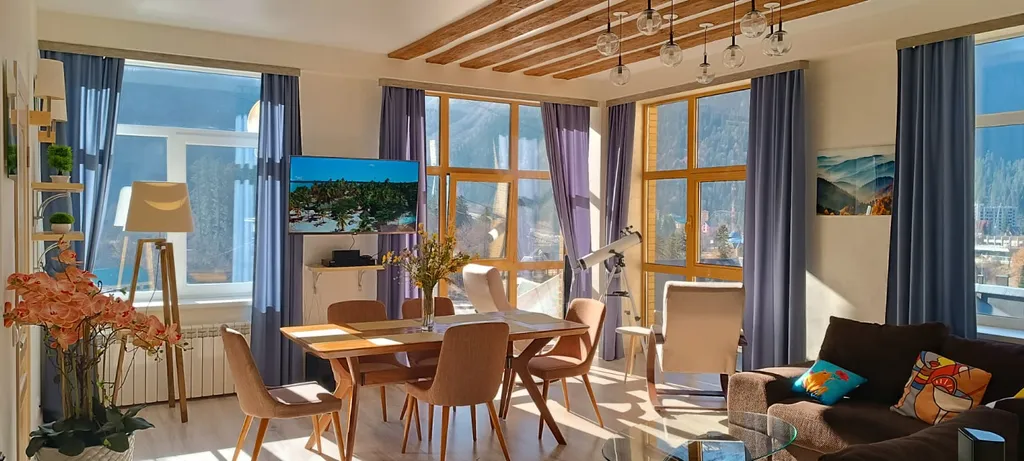 Апартаменты с восхитительными панорамными видами на вершины Домбая