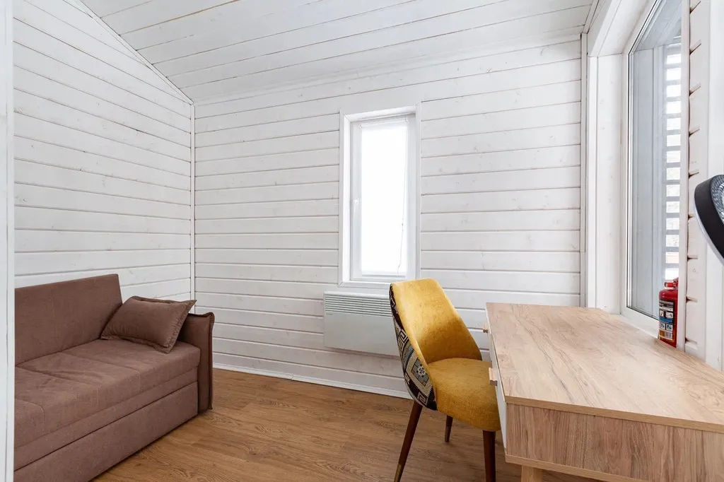 Современный дом с баней в лесу