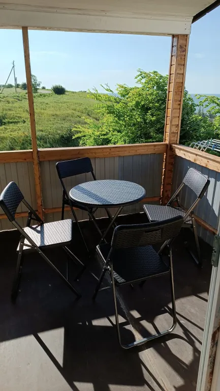 Двухуровневый номер с кухней и видом на море