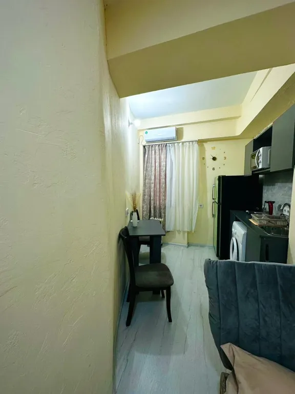 В центре рядом с музеем Сергея Параджанова