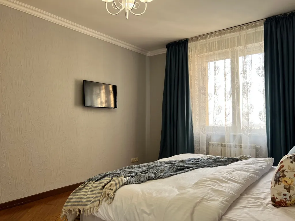 Уютная квартира с прекрасными видами в центре Алматы